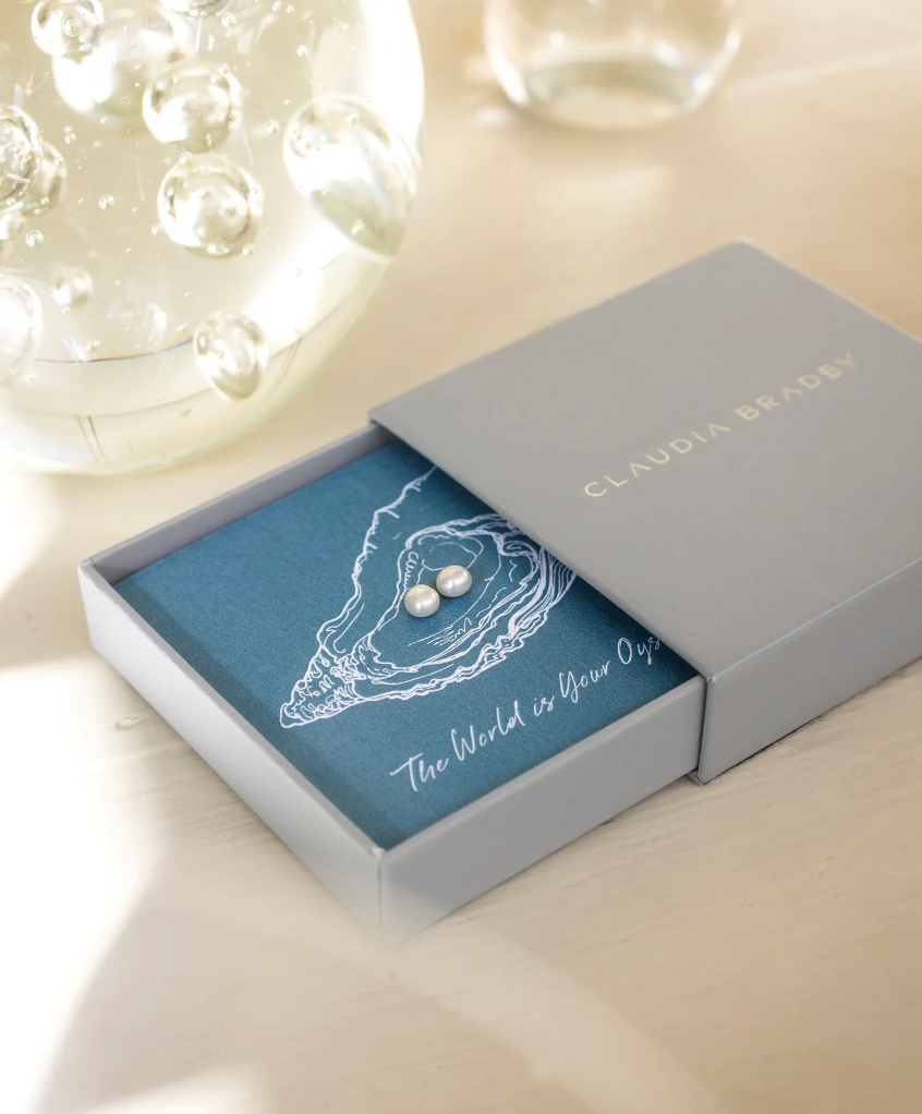 CLAUDIA BRADBY THE WORLD IS YOUR OYSTER GIFT CARD WITH PEARL STUDS