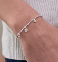 ESTELLA BARTLETT TRIPLE WHITE ENAMEL FLOWER BRACELET